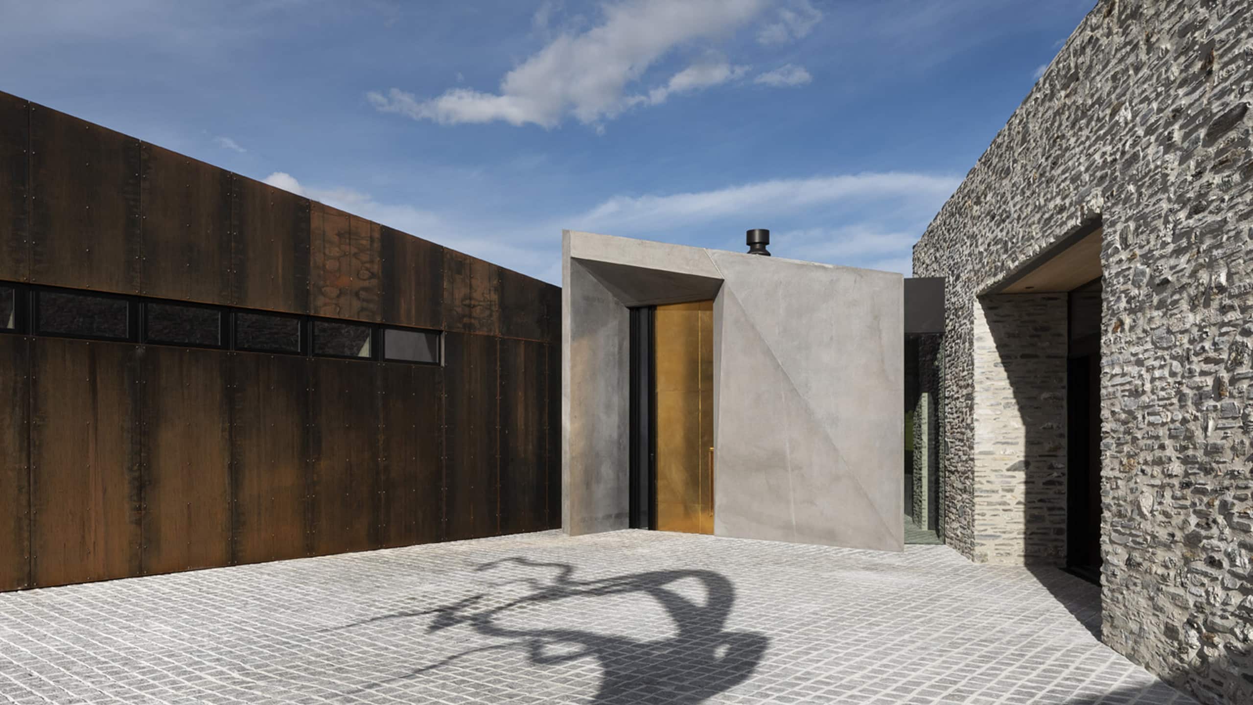 coloured concrete wall in award winning Arrowtown home.