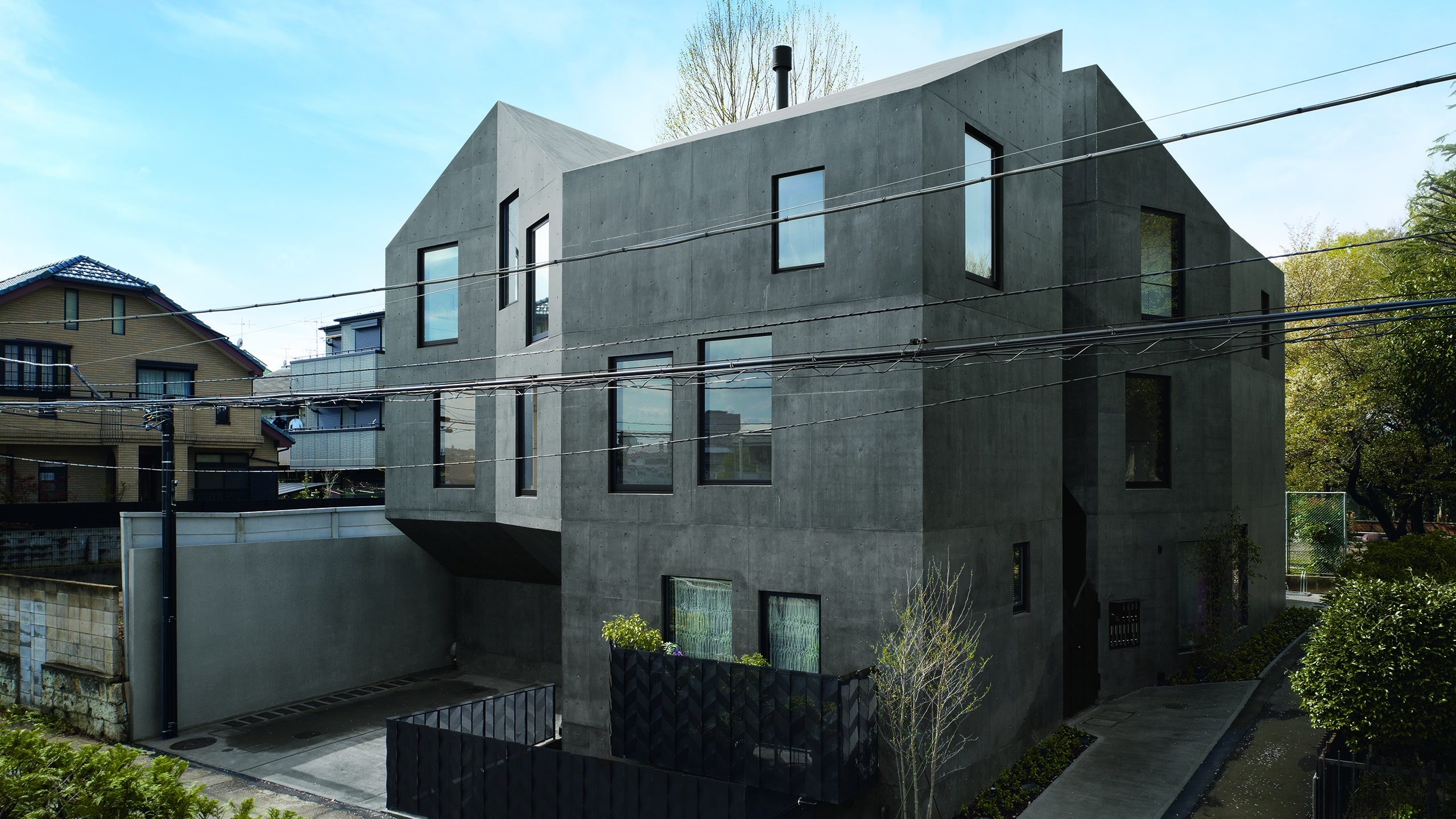 coloured concrete house made of precast panels.