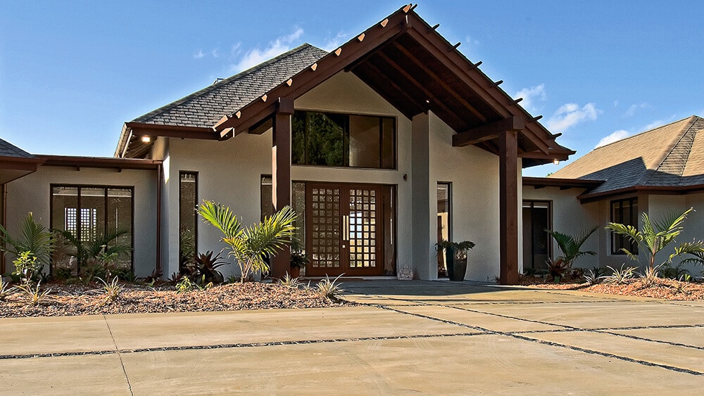 Coloured concrete driveway at suburban home.