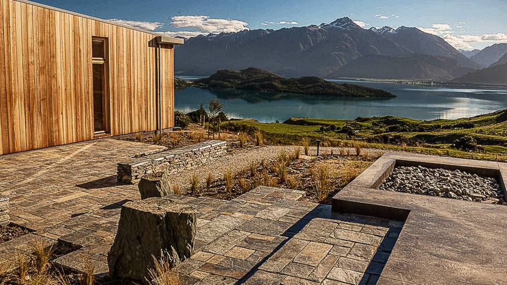 coloured concrete patio overlooking lake in Central Otago