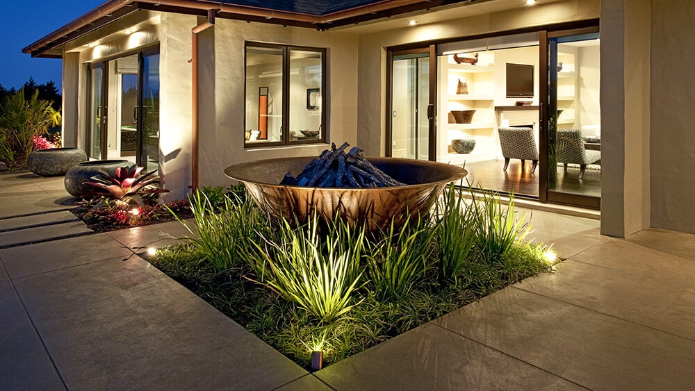 Coloured concrete courtyard at night