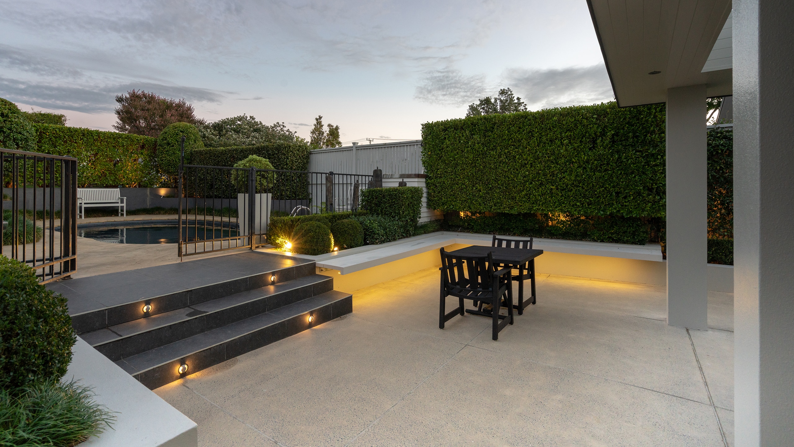 f16-PFL-PH-House-HIGH-Res-2 concrete patio and pool surround